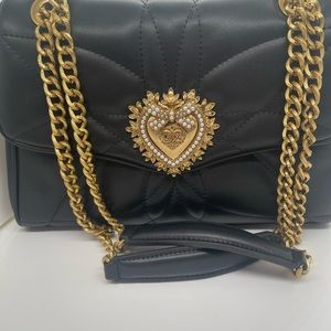 Devotion Gorgeous bag with heart hardware in antique gold!.